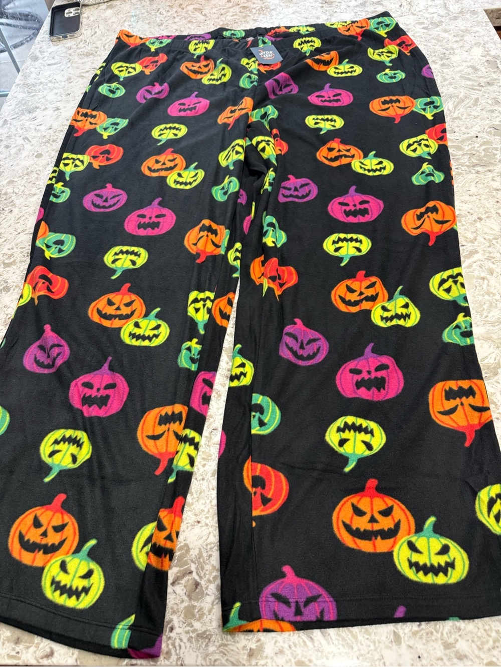 Women’s Black Halloween Pumpkin Pajama Pants - Neon Multicolor